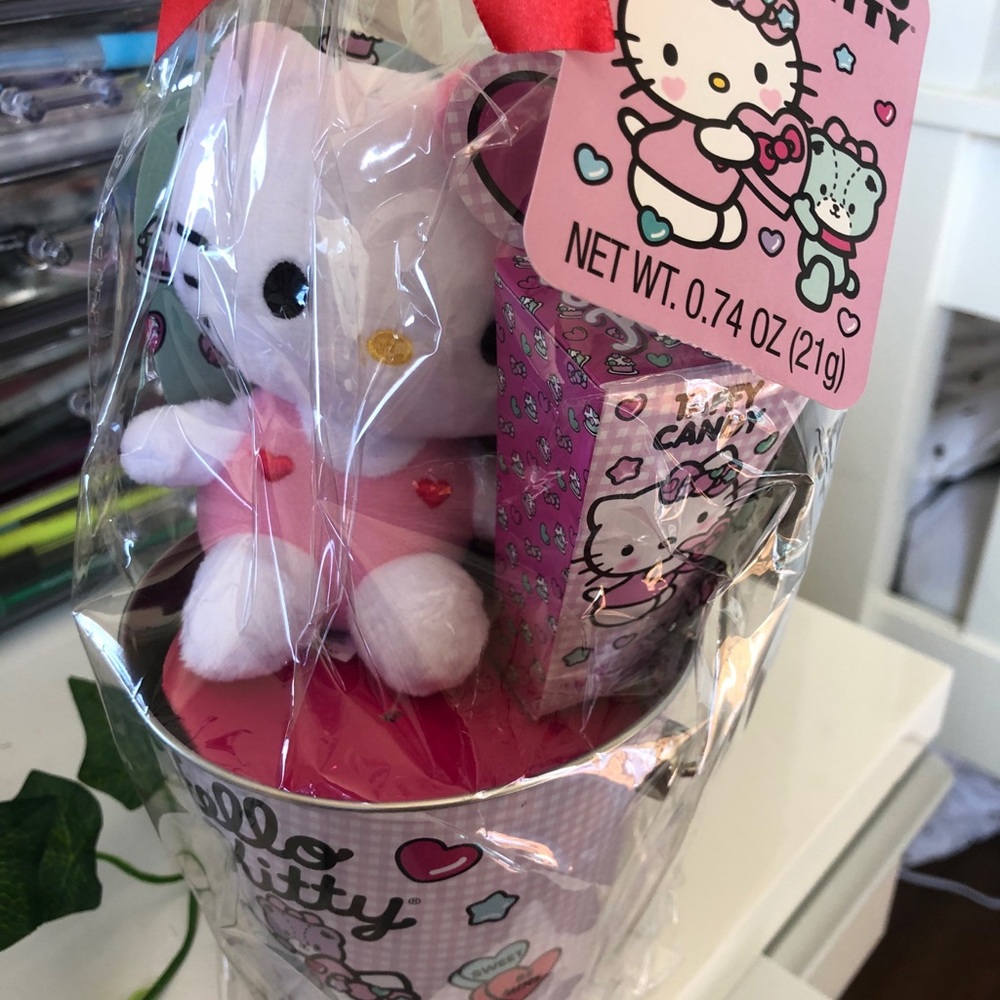 hello kitty valentines and a roll of toilet paper